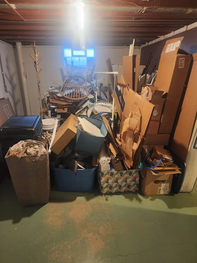 Roll-off dumpster container at job site for 6 Yard Dumpster Rental in Longmont